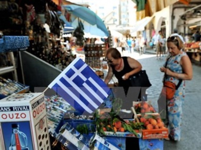 Yunani akan menerima 13 miliar Euro yang pertama dalam paket talangan baru untuk membayar utang - ảnh 1